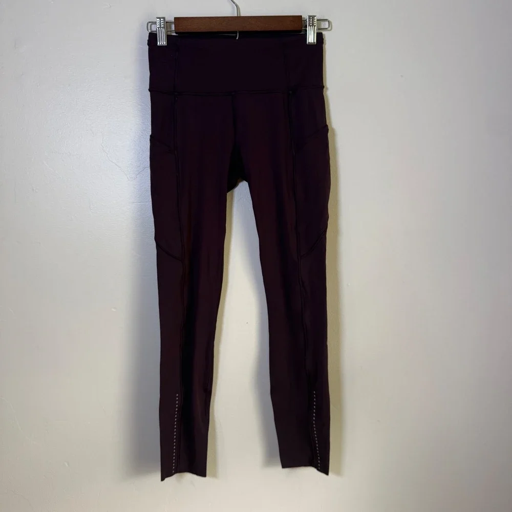 Lululemon Fast and Free High Rise Reflective Pocket Leggings Size 4 Plum